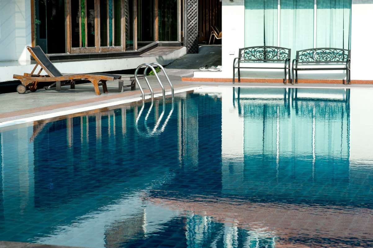 Blue swimming pool with copy space and a hot-weather feel