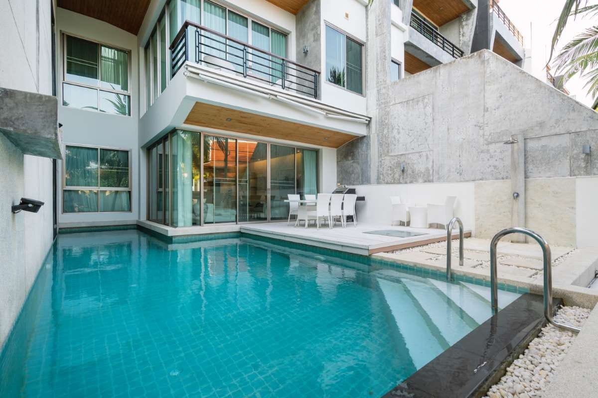 Luxury villa with outdoor swimming pool and modern exterior design