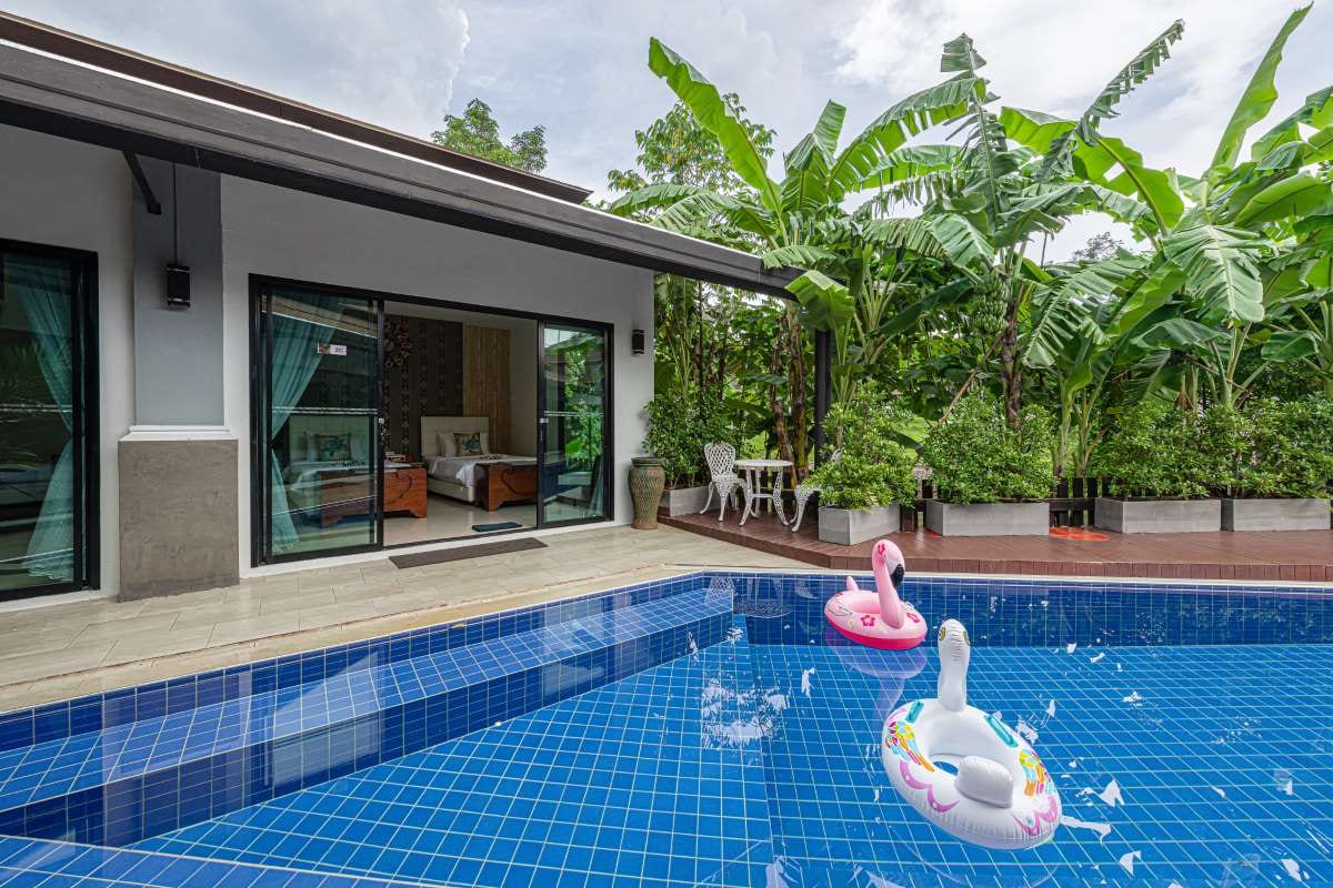 Modern tropical villa exterior with a swimming pool
