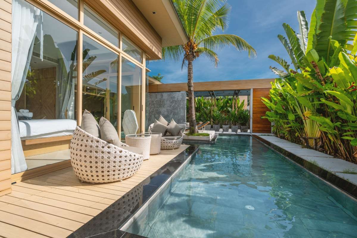 Luxury villa interior with swimming pool and bedroom view