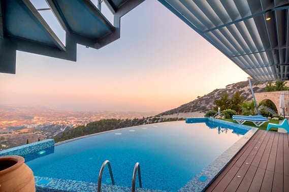 Setting pool service prices — residential home with backyard pool, the typical account a pool route price applies to