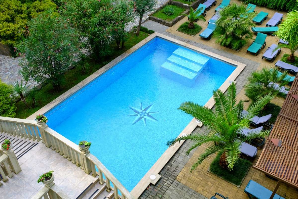 Calm pool water surface with gentle ripples