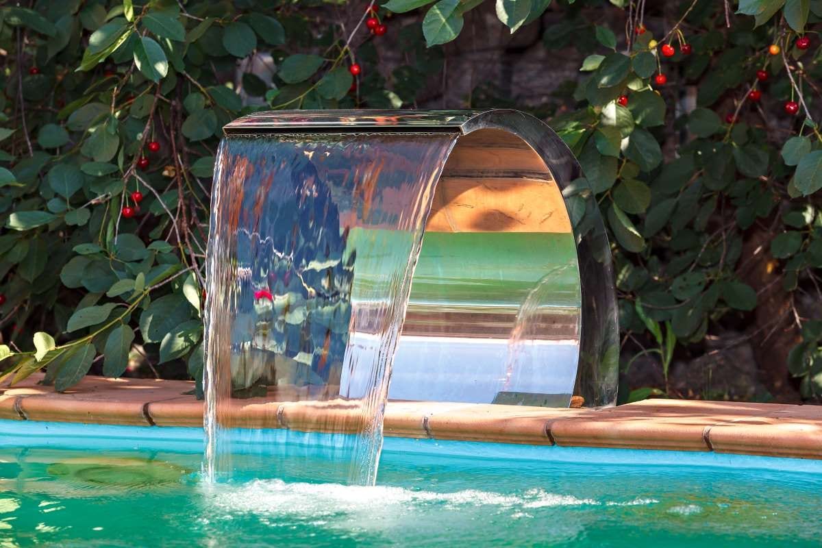 Pool water recirculation system by a waterfall for cleaning and supply