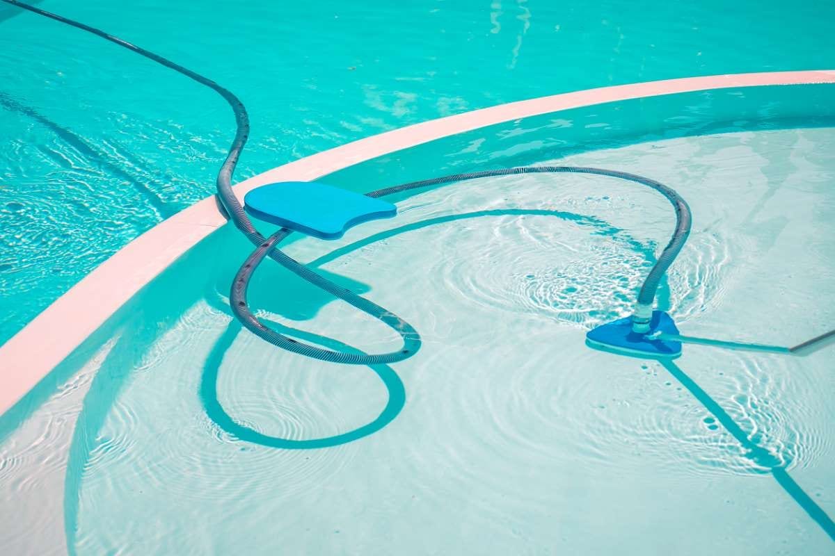 Underwater vacuum cleaner cleaning the bottom of a pool